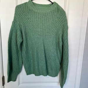 Green cable knit sweater